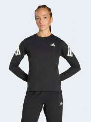 Adidas Koszulka w kolorze czarnym do biegania rozmiar: M. Czarne bluzki sportowe damskie Adidas, m, z materiału, bez kołnierzyka, bez ramiączek. Za 129.95 zł.